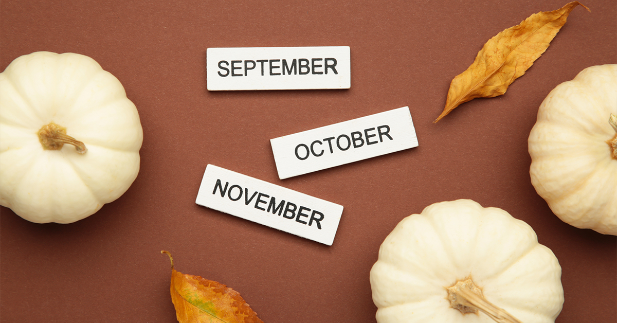 Name plates with September, October, November month names with pumpkins and leaves on brown background.