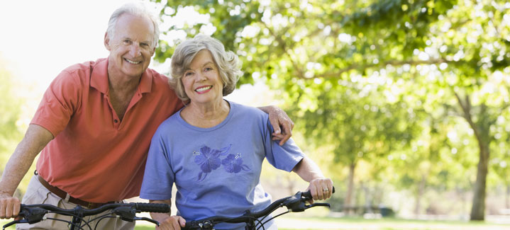 a healthy couple smiles